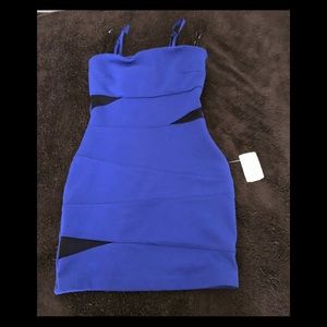 Stretchy thick material w black see through mesh.